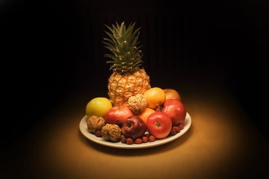 Fruits with pineapple - evening still life