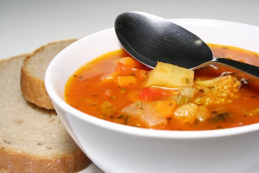 Fresh vegetable soup with bread