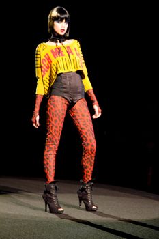 NEW YORK, NY - FEBRUARY 14: A model walks the runway at the Betsey Johnson Fall 2011 fashion show during Mercedes-Benz Fashion Week at The Theatre at Lincoln Center on February 14, 2011 in New York City. (Photo by Diana Beato)