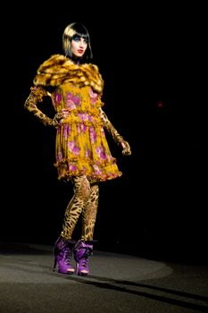 NEW YORK, NY - FEBRUARY 14: A model walks the runway at the Betsey Johnson Fall 2011 fashion show during Mercedes-Benz Fashion Week at The Theatre at Lincoln Center on February 14, 2011 in New York City. (Photo by Diana Beato)