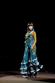 NEW YORK, NY - FEBRUARY 14: A model walks the runway at the Betsey Johnson Fall 2011 fashion show during Mercedes-Benz Fashion Week at The Theatre at Lincoln Center on February 14, 2011 in New York City. (Photo by Diana Beato)