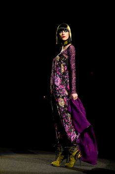 NEW YORK, NY - FEBRUARY 14: A model walks the runway at the Betsey Johnson Fall 2011 fashion show during Mercedes-Benz Fashion Week at The Theatre at Lincoln Center on February 14, 2011 in New York City. (Photo by Diana Beato)