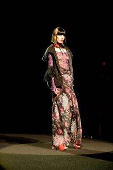 NEW YORK, NY - FEBRUARY 14: A model walks the runway at the Betsey Johnson Fall 2011 fashion show during Mercedes-Benz Fashion Week at The Theatre at Lincoln Center on February 14, 2011 in New York City. (Photo by Diana Beato)