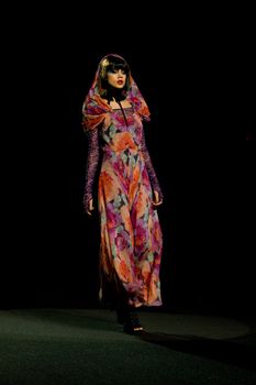 NEW YORK, NY - FEBRUARY 14: A model walks the runway at the Betsey Johnson Fall 2011 fashion show during Mercedes-Benz Fashion Week at The Theatre at Lincoln Center on February 14, 2011 in New York City. (Photo by Diana Beato)