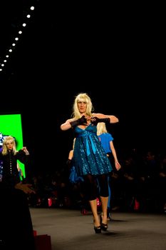 NEW YORK, NY - FEBRUARY 14: A model/coworker walks the runway at the Betsey Johnson Fall 2011 fashion show during Mercedes-Benz Fashion Week at The Theatre at Lincoln Center on February 14, 2011 in New York City. (Photo by Diana Beato)