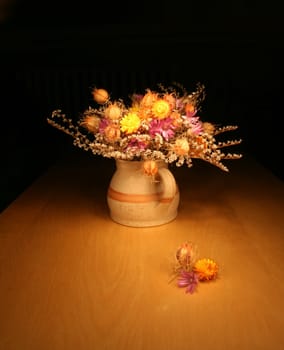 Bunch of everlasting flowers - dark still-life