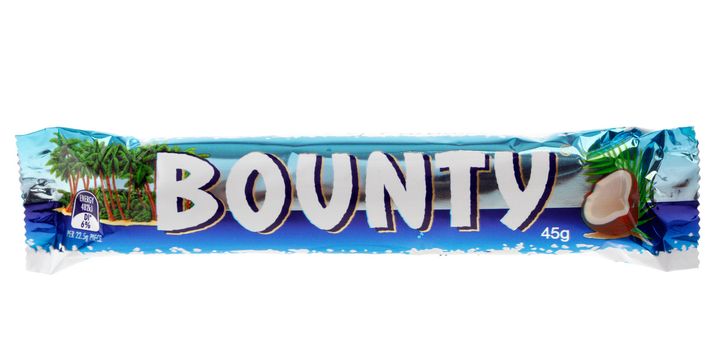 Bounty chocolate coconut bar 45g  (964kj)  Made by Mars Inc.  It is sold throught the world but not in the U.S.A.  White background.  Editorial Use Only.