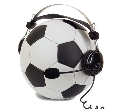 soccer concept, ball in headphones, as commentator isolated on white