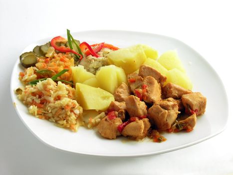 chicken meat with potatoes and vegetable