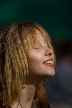 smiling girl with red hair
