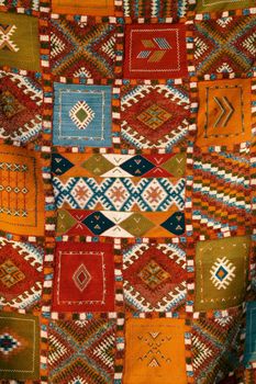 Selection of wonderfully bright colourful cloth at a market stall in Fez, Morocco