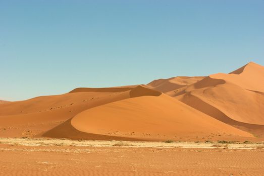 Incredible huge dunes of sand located in Sossusvlei in Namibia within the Namid desert