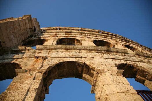 Arena of Pula in Croatia with a blue sky in the background and a nice sunset