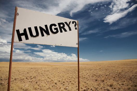 Hungry signboard in the de desert of Namibia