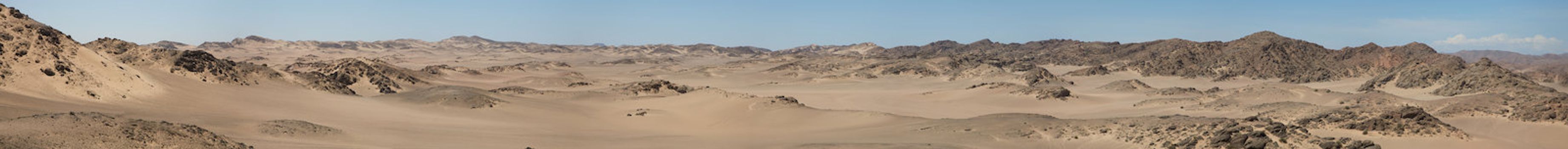 Surreal panorama of the white sand dune sea in the Skeleton Coast