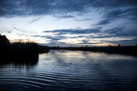 Okavango delta in botswana and sunset - Moremi Reserve