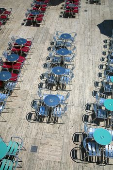 Several round tables in the typical cafe in Budapest in Hungary