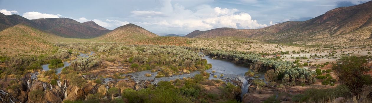 The Epupa Falls lie on the Kunene River, on the border of Angola and Namibia