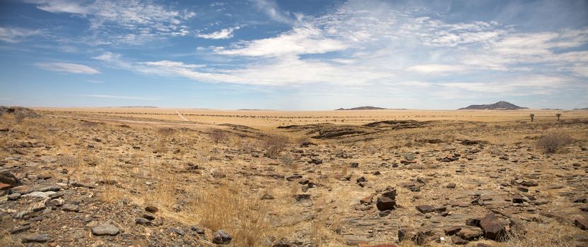 Surreal panorama of the Namib desert going towards solitaire and sossusvlei