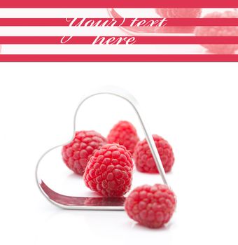 Fresh raspberries with metallic heart (easy removable text)