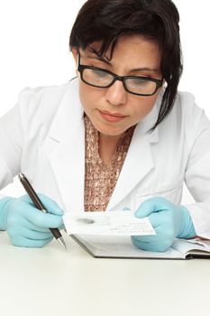 A forensic scientist or criminologist holding a fingerprint and fingerprint forensic card.