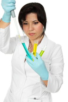 A scientist using a pipette and test tubes.  White background.