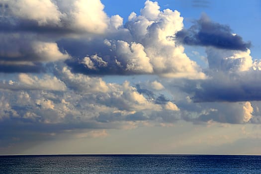 Landscape with calm sea and cloudiness sky