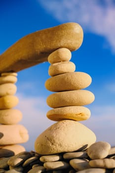 Stack of zen stones on a sky background