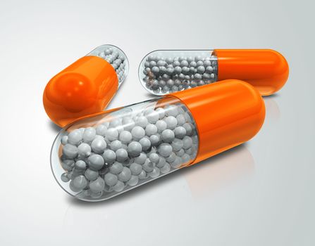 three 3D transparent capsule pills