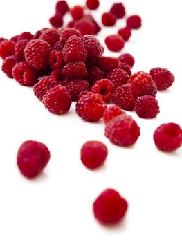 Raspberries fruits isolated over a white background