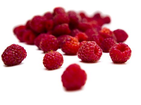 Raspberries fruits isolated over a white background