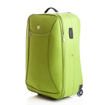 Green suitcase isolated over a white background
