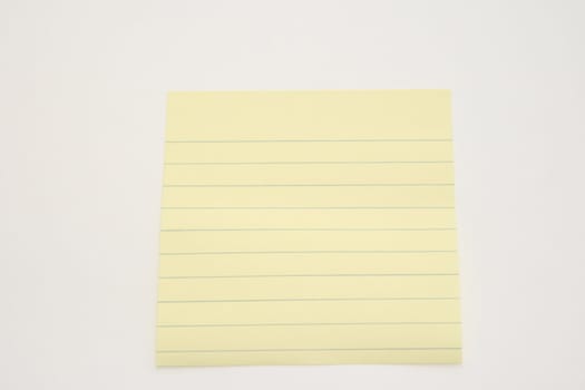 lined blank yellow sticky note ready for your message