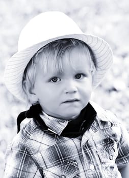 the lovely little boy with a hat