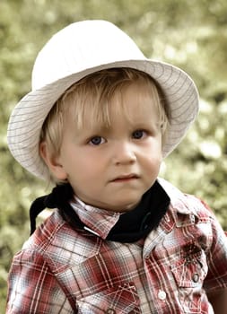 the lovely little boy with a hat