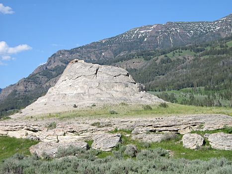 A photograph of a peaceful mountain landscape.