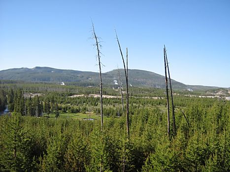 A photograph of a peaceful mountain landscape.