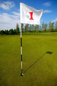 Closeup of golf flag number one