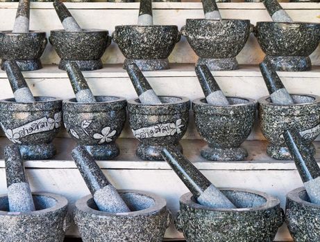 Pestle and stone mortar , Thai cooking tool.