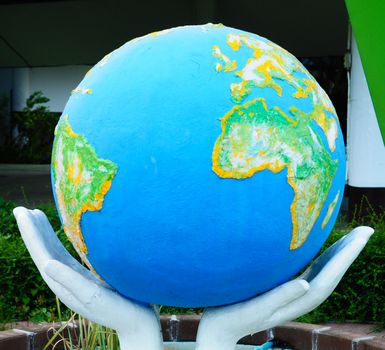 Hands holdings a globe