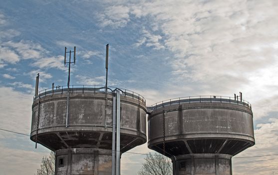 water towers, reserve of water, on blue sky