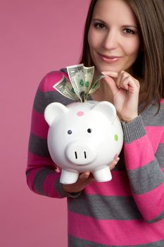 Piggy bank girl taking money