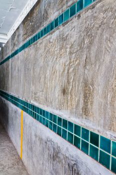 Concrete wall, a table format. And squares.