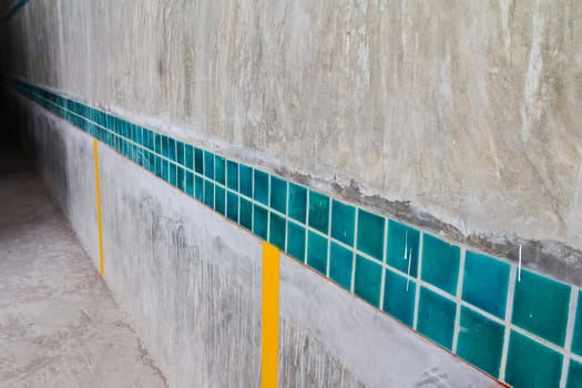 Concrete wall, a table format. And squares.