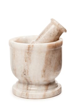 Marble mortar and pestle isolated on white background