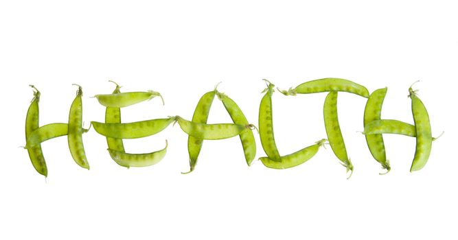 Healthy vegetable concept using pea pods to spell out word