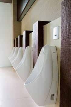 Urinals in the men's bathroom.