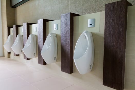 Urinals in the men's bathroom.