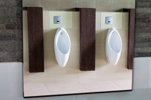 Urinals in the men's bathroom.