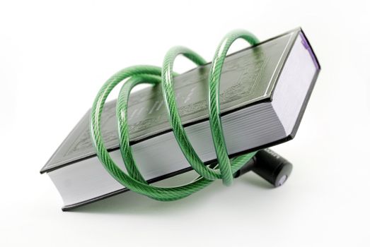 a book surrounded by a padlocked cable